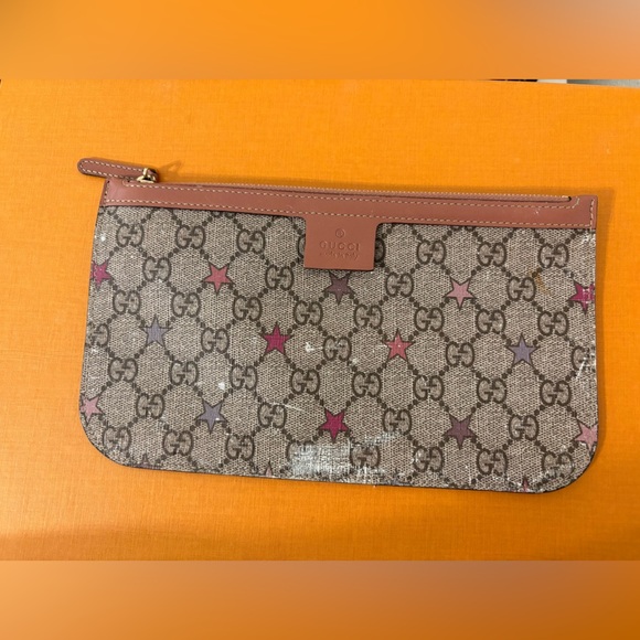 Gucci Handbags - Gucci GG Supreme Star Print Pouch